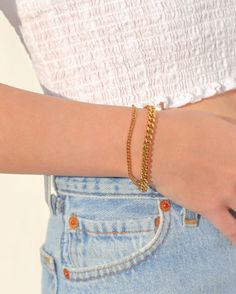 Our Curb chain bracelet is the perfect minimalist everyday gold bracelet. Meant for everyday wear and great for people with sensitive skin. Also an affordable alternative to solid 18k gold because this necklace is waterproof and tarnish resistant. Hypoallergenic Stainless Steel with thick layer of 18k gold PVD coating. BUY 2, GET 1 FREE. Coupon applied at checkout. - 18k gold plated- Bracelet length: 6.5 inch with 2 inch extension- Bracelet width available in 3mm / 6.3mm / 8mm- Waterproof / Tarn Pvd Coating, Link Chain Bracelet, Snake Chain Bracelets, Gold Plated Bracelets, Cuban Link Chain, Cuban Link, Steel Jewelry, Curb Chain, Stainless Steel Jewelry