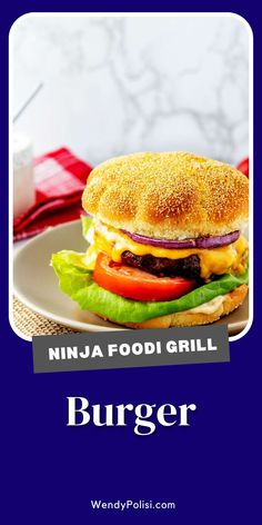 a burger on a plate with the words ninja foodi grill burger written below it