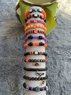 a stack of bracelets sitting on top of a table