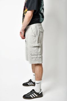 🚀Get it before Christmas by choosing super-fast DHL Express shipping at your cart (checkout). It takes only 1-2 b. days to European Union countries and 2-5 b. days to USA, Canada and other countries. All orders are ready to ship in 1 b. day. 🔥Multi pocket cargo Y2K men's long shorts in beige/grey colour. Size - M (33). Model is 177 cm / 5ft 9.6" tall and usually wears size M. Very good vintage condition. Only 1 available! All orders are shipped every day Worldwide from 🇪🇺EU. Safe registered Summer Cargo Shorts With Multiple Pockets For Outdoor Activities, Bermuda Cargo Shorts With Multiple Pockets For Summer, Summer Bermuda Cargo Shorts With Multiple Pockets, Gray Cargo Pocket Shorts For Streetwear, Gray Cargo Shorts With Pockets For Outdoor, Gray Cargo Pants With Pockets For Summer, Summer Gray Cargo Pants With Cargo Pockets, Gray Cotton Shorts For Outdoor Activities, Beige Shorts With Pockets For Outdoor Activities