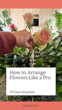 someone is arranging flowers like a pro with text overlay that reads how to arrange flowers like a pro