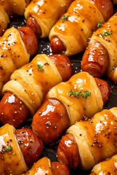 hotdogs wrapped in crescented bread and garnished with parsley