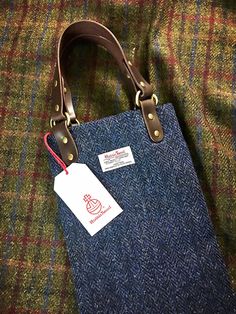 I run a Facebook page OSKAR'S BESPOKE TOTE BAGS, introducing my handmade tote and luggage. I love fabric and sewing About: A premium 100% locally handmade gift for those who value quality and local craftsmanship. Our Bespoke Luggage expresses artistry and passion through our craftsmanship. Each Luggage is carefully handmade into existence, from only the finest specially selected official Harris Tweed cloths from Scotland, finished with locally sourced genuine bridal leather. Specification: - Mea Handmade Tote, Page Facebook, Wine Bag, Harris Tweed, Hong Kong, Tote Bags, Leather Straps, Sell On Etsy, Genuine Leather