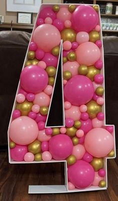 the number four is made up of balloons