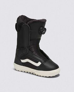 a pair of black snow boots with white soles