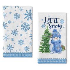 two towels with snowmen on them and let it snow