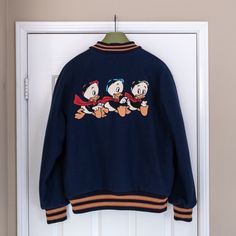 Gucci X Disney Men's Bomber Jacket -Brand New, Never Worn -Size 48 -Navy Wool -Huey, Dewey, And Louie Patch On Back -Gucci Patch On Left Arm -Includes Garment Bag Sporty Gucci Outerwear For Fall, Gucci Sporty Streetwear Outerwear, Gucci Sporty Outerwear For Streetwear, Sporty Gucci Outerwear For Streetwear, Vintage Gucci Long Sleeve Outerwear, Blue Gucci Winter Outerwear, Casual Blue Gucci Outerwear, Gucci Leather Jacket, Huey Dewey And Louie