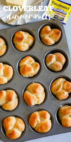 a muffin tin filled with freshly baked hot cross buns