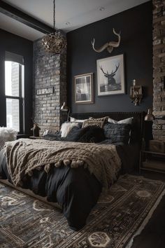 a bed sitting in a bedroom next to a brick wall and a rug on top of a wooden floor