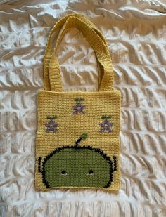 a small bag with an apple on it