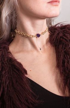 The ViVi Leather Choker - a bold and elegant accent in your wardrobe. Crafted from high-quality black leather, adorned with beautiful natural amethyst, and finished with gold chains. It gracefully accentuates the neck, adding a unique touch to your ensemble. Its design is truly one-of-a-kind. Whether it's a party, a date, or a corporate event, this choker will complement any occasion, enhancing your confidence and allure." We also offer similar chokers with different leather, allowing you to create fantastic combinations. It is suitable for both summer and winter wear, making it a versatile accessory. Before purchasing, measure your neck circumference and choose the corresponding size: XS: 30-32cm S: 32-34cm M: 34-36cm L: 36-38cm XL: 38-40 inchescm With love, Your guide to daring accessori Luxury Adjustable Chain Choker For Parties, Luxury Festival Choker, Leather Choker Necklace, Boho Chic Jewelry, Leather Chokers, Jewelry Choker, Choker Necklaces, Leather Chain, Leather Necklace