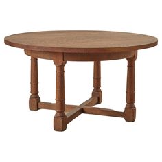 a round wooden table with two legs