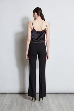 We chose our favorite Fluid Crepe for our best-selling modern fit and flare pant. Incredibly flattering, it mixes elegance and style with a touch of boldness. Get ready for the compliments. Elie Tahari Exclusive Fit & Flare tailored dress pant in Fluid Crepe with front zip closure & belt loops 70% Triacetate, 30% Polyester High Rise, Boot Cut; Runs true to size. Model is 5'9" and wearing size 2 Measurements: Front Rise 9.8"L, Inseam 34.5"L (approx. length for a size 28) Dry Clean Only Imported Style #: E2087204 Flare Pant, Jumpsuit Jacket, Long Sleeve Short Dress, Tailored Dress, Elie Tahari, Knit Tees, Dress Pant, Denim Coat, Knit Jacket