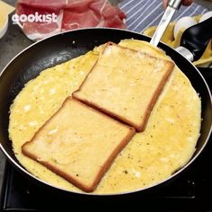 two pieces of toast sitting in a skillet