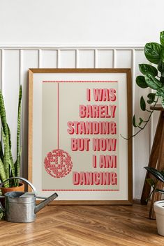 a framed print with the words i was barely standing but now i am dancing