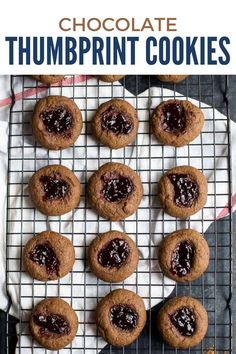 These chocolate thumbprint cookies are filled with a sweet raspberry jam center, making them irresistible! Perfect for a holiday cookie tray or as a special treat any time of year. Whip up a batch of these decadent delights in no time! Raspberry Thumbprint, Raspberry Thumbprint Cookies, Chocolate Thumbprint Cookies, Awesome Recipes, Cozy Meals, Cookie Tray, Thumbprint Cookies, Christmas Food Desserts, Christmas Dessert