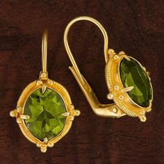 Renaissance jewelry is splendidly reborn. This ensemble belongs at a ball, or at least taken out for a night of dancing. 24k gold over sterling silver granulated settings augment the brilliant sparkle of faceted peridot. European backs. Size: 1 Inch. Elegant Peridot Earrings For Wedding, Gold Peridot Fine Jewelry, Classic Gold Peridot Jewelry, Fine Jewelry Gold Peridot, Classic Gold Jewelry With Peridot, Fine Jewelry In Gold With Peridot, Fine Gold Peridot Jewelry, Classic Peridot Jewelry For Formal Occasions, Formal Peridot Drop Earrings