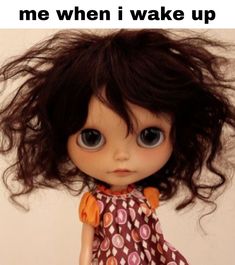 a close up of a doll's hair with the caption me when i wake up