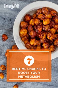 a white bowl filled with food sitting on top of a gray counter next to a sign that reads bedtime snacks to boost your metabolism