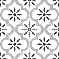 an artistic black and white tile design