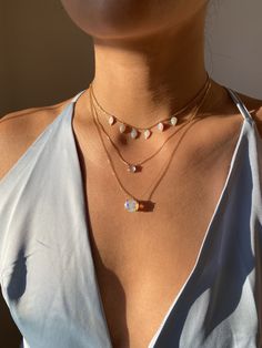 Our radiant teardrop opal necklace is named after Ahurani, the Persian Goddess of Water. Ahurani represents water in all it's many forms - rain, snow, rivers, lakes, and the oceans. Ahurani is a source of life and symbolizes purity, motion, and renewal. DETAILS- Crafted with pure solid 14k yellow gold- Each chain includes 2 adjustable loops- Chain style may vary slightly- Natural, genuine opals- Made in New York*Note:We do our best to choose opals with a rich and vibrant color, however, please n Goddess Of Water, Chain Loop, Opal Necklace, Chain Styles, Persian, Solid Gold, Opal, Motion, Vibrant Colors