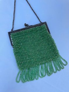 Antique 1930s green beaded fringe evening bag/purse Pictured next to hand so you can see size on a chain metallic strap in impeccable condition for its age rare gem Green Beaded Rectangular Evening Bag, Green Beaded Evening Bag, Elegant Green Beaded Evening Bag, Vintage Rectangular Fringe Bag, Rectangular Beaded Fringe Evening Bag, Vintage Green Beaded Bag, Wedding Bags, Wedding Bag, Rare Gems