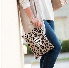 "This adorable Leopard Zip Pouch is the perfect for storing jewelry, cosmetics or items needed for when you're on the go! It makes a great gift for bridesmaids, graduates or any other special occasion! 12\" L x .75\" W x 9\" H Burlap Gold Toned Zipper Closure Monogram (first, LAST, middle) or Name or Single Initial -example- Mary Elizabeth Williams = m W e Monogram font (see picture above for choices) Thread color (see picture above) All sales are final! **Note** Please make sure you list your m Luxury Monogram Canvas Clutch, Luxury Designer Monogram Canvas Pouch, Luxury Monogram Canvas Travel Pouch, Luxury Monogram Canvas Clutch For Women, Luxury Monogram Canvas Rectangular Pouch, Luxury Monogram Canvas Bag With Removable Pouch, Luxury Monogram Canvas Pouch Shoulder Bag, Luxury Monogram Canvas Box Bag With Removable Pouch, Monogram Cosmetic Bag