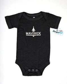 Great for the future pilot! This super soft onesie is made with combed ringspun cotton and features a super cool distressed foil graphic. Snap closures make changing a breeze. Bella Canvas Charcoal Black Tri-Blend Distressed Foil Graphic 3.8 oz., 50/25/25 polyester/Airlume pre-shrunk combed and ringspun cotton/rayon Side seam, Envelope neck, Snap leg closure MADE IN USA Casual Cotton Bodysuit With Letter Print, Cotton Onesie With Letter Print And Crew Neck, Cotton Crew Neck Onesie With Letter Print, Black Casual Onesie With Graphic Print, Casual Unisex Onesie With Letter Print, Casual Cotton Onesie With Crew Neck, Fitted Soft-washed Cotton Onesie, Casual Crew Neck Cotton Onesie, Casual Cotton Crew Neck Onesie