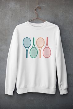 ・Tennis Racket Pattern, the perfect Crewneck Sweatshirt! Everything in my shop is done with great care for detail and perfection. ・Product Information: .: 50% cotton, 50% polyester .: Medium-heavy fabric (8.0 oz/yd² (271.25 g/m .: Loose fit .: Comfy wear .: Sewn-in label .: Runs true to size ・Link back to my shop for more products: www.FFAestheticDesign.etsy.com ・Copyright Information: ©FFAestheticDesign owns the copyright of this design. White Sportswear Tops For Tennis, Sporty Tennis Tops For Sports Season, White Tennis Top Sportswear, Sporty White Tennis Tops, Long Sleeve Graphic Print Tops For Tennis, Long Sleeve Graphic Print Tennis Tops, Pre-shrunk Crew Neck Tennis Tops, Sporty Pre-shrunk Tennis Tops, Casual Tennis Tops With Screen Print