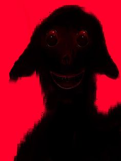 a black dog with red eyes and a creepy smile on its face is standing in front of a red background