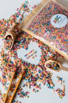 sprinkles and scissors are on the table