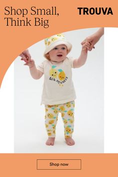 Short-sleeved baby and toddler t-shirt with a 'Big Squeeze' lemon print from The Bonnie Mob. The GOTS certified organic cotton and the relaxed fit makes it very comfortable for little ones to wear. The top is designed in a kimono t-shirt style with a slightly longer back than the front and rolled back sleeves. It comes with press studs (on sizes 0-24M) to make dressing easier. Pair the unisex baby tee with matching accessories and a nice pair of trousers or shorts for a sustainable summer outfit Hareem Pants, Harem Trousers, Kimono Design, Lemon Print, Baby T Shirts, Baby And Toddler, Matching Accessories, How To Squeeze Lemons, Roll Up Sleeves