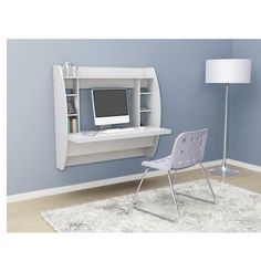 a white desk with a computer on it