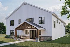 a large white house with a covered porch