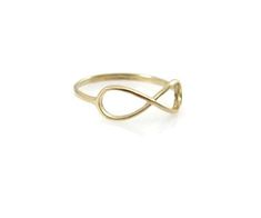 Infinity ring. 14k solid Yellow gold infinity ring. infinity gold ring. infinity ring. dainty gold ring. gold ring. gift for her. infinity jewelry ▶▶This is a great ring to wear by itself, it sure stands out by it's own.. or it can be combined with your every day or festive jewelry for a smart individualist style. It fits both styles, casual and fancy for any occasion◀◀ ♥ About The Ring: The ring's width is 2 mm. ♥ Shipping Info: All rings are packaged and shipped in a beautiful ring box. It tak Elegant Gold Midi Rings With Infinity Shape, Elegant Gold Infinity Midi Rings, Gold Minimalist Infinity Midi Rings, Dainty Gold Infinity Stackable Rings, Elegant Infinity Midi Rings As Gift, Minimalist Yellow Gold Infinity Ring, Dainty Infinity Ring With Simple Design, Dainty Infinity Rings With Simple Design, 14k Gold Infinity Ring