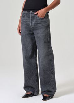 Designed for comfort and style. Our Low Slung Baggy features an ultra-relaxed yet ultra-flattering silhouette. This upsized fit sits low on the hips with a directional, baggy straight leg. Cut with a longer inseam and crafted in our signature Organic Cotton, this pair will only grow softer with each wear. This style is meant to be worn low on the hip and intended to be oversize. Size down for a closer fit.Looks Like: Washed black Feels Like: Zero stretch cotton with an authentic vintage hand Baggy Utility Rigid Denim Bottoms, Baggy Distressed Rigid Denim Bottoms, Baggy Rigid Denim Jeans For Everyday, Baggy Black Rigid Denim Pants, Agolde Low Slung Baggy, Low Rise Baggy Jeans, Citizens Of Humanity, Baggy Jeans, Stretch Cotton