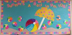 a bulletin board with an umbrella, beach ball and polka dot dots on it that says summer's a ball in r m 08