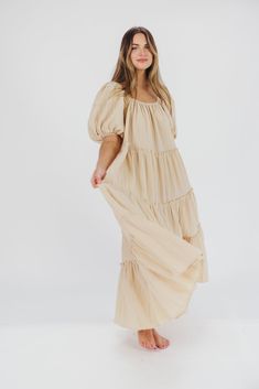 Gently feminine, the Eva Puffed Sleeve Maxi Dress is the perfect choice for the fashion-forward woman. Featuring dramatic balloon sleeves, an elastic neckline for easy wear (and easy nursing!), and tiers of ruffles for a charming yet sophisticated look, this elegant maxi dress is designed with style and comfort in mind. Its relaxed fit makes it a gorgeous choice for expecting mamas. FIT: Runs slightly oversized - very relaxed fit. Your true size will accommodate most baby bumps. MATERIAL: 91% Po Max Dress, Garment Details, Tiered Ruffle Skirt, Elegant Maxi Dress, Sleeve Maxi Dress, Baby Bumps, Low Iron, Maxi Dress With Sleeves, Ruffle Skirt