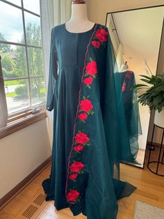 Gown length- 55 inch Sleeve length- 25 inch Dupatta-2 1/2 meter Neck - 5 1/2 inch Back zip not available Sheer Dupatta Maxi Gown For Festivals, Maxi Length Gown With Sheer Dupatta For Festivals, Festival Maxi Gown With Sheer Dupatta, Unstitched Maxi Gown With Sheer Dupatta, Fitted Green Chanderi Gown, Festive Anarkali Maxi Dress With Sheer Dupatta, Anarkali Gown With Sheer Dupatta, Fitted Designer Wear Long Gown, Festive Maxi Dress With Sheer Dupatta And Traditional Drape