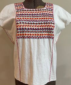 This Embroidered top is (possibly) homemade and is in Perfect condition!!  It has no labels, but the detail is incredible!  Cream color with deep red, green, blue and orange thread.  A great find for any age and could go anywhere! Armpit to Armpit - 23" Shoulder to Bottom - 25" Embroidered Top, Cream Color, Womens Clothing Tops, Blouses For Women, Labour Day, Art Collection, Bathing Beauties, Tops & Tees, The Incredibles