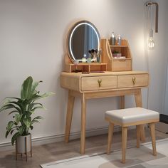 a dressing table with a mirror and stool next to a potted plant on the floor