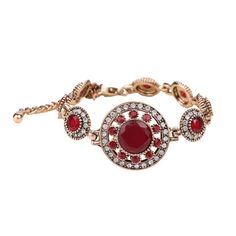 Turkish jewelry red stone charm bangle with crystal insert accents in ancient gold color. An old world design that adds character and flair to any outfit. Details Item Type: Fashion Bracelets Metal Type: Copper,Brass Plating: Gold Material: Resin,Crystal Length: 17.5+6.5cm Luxury Red Spiritual Jewelry, Christmas Stones, Turkish Bracelet, Gems Bracelet, Vintage Fine Jewelry, Lady Girl, Choker Pendant, Diamond Dangle Earrings, Turkish Jewelry