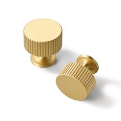 two brass knobs on white background with clipping for the top and bottom part