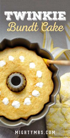 a cake in a pan with the words twinkie poke cake on it's side