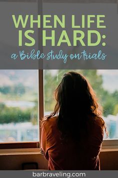 a woman sitting in front of a window with the words when life is hard, a bible study on trials