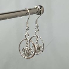 These Sterling Silver Sea Turtle Earrings are a must-have for any ocean lover. The intricate turtle design is made from high-quality sterling silver, ensuring durability and lasting beauty. Show off your love for the sea with these elegant earrings. Silver Sea, Turtle Earrings, Turtle Design, Authentic Jewelry, Ocean Lover, Elegant Earrings, Sea Turtle, Sterling Silver Earrings, Jewelry Shop