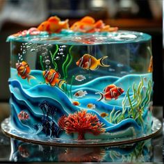 there is a cake decorated with fish and corals