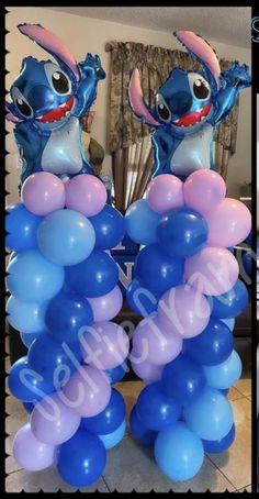 some balloons that are shaped like stitchers