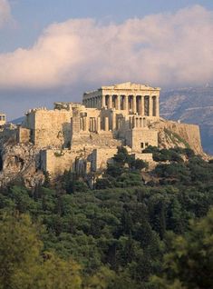 an ancient building on top of a mountain