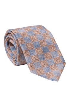 This handmade Italian silk Bourette tie with a checkerboard pattern will give a casual sophistication to your look. 100% Made in Como, Italy. Standard Length: Approx. 3.25" x 58.5". A classic tie width and length that is perfect for most men up to 6'2". Silk Bourette: Made from 75% silk, 25% cotton. It has a knobby, irregular texture giving the colors a beautiful mottled appearance. 3-fold construction: This ensures your tie maintains its shape and effortlessly creates a flawless knot for a trul Fitted Plaid Ties, Men Bedding, Luxury Ties, Tie For Men, Como Italy, Rollerball Perfume, Checkerboard Pattern, Maternity Shops, Fragrance Design